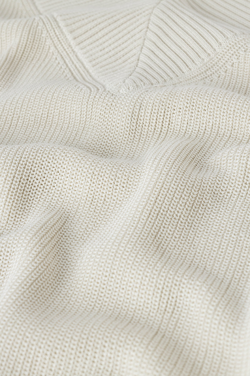 Jersey de algodón tejido en punto perlado con cuello V