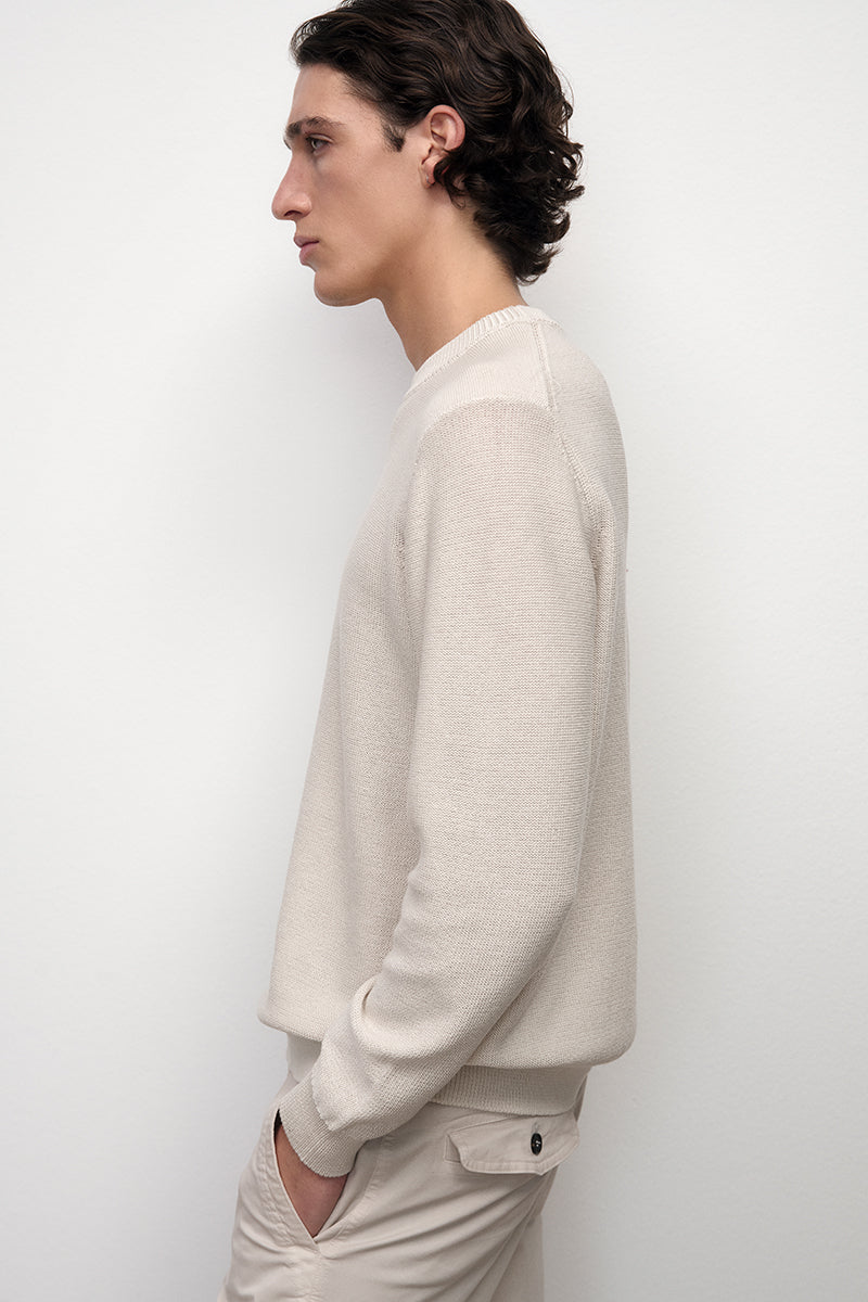 Reverse knitted sweater