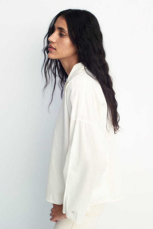 cotton blouse with polo-style collar and long sleeves