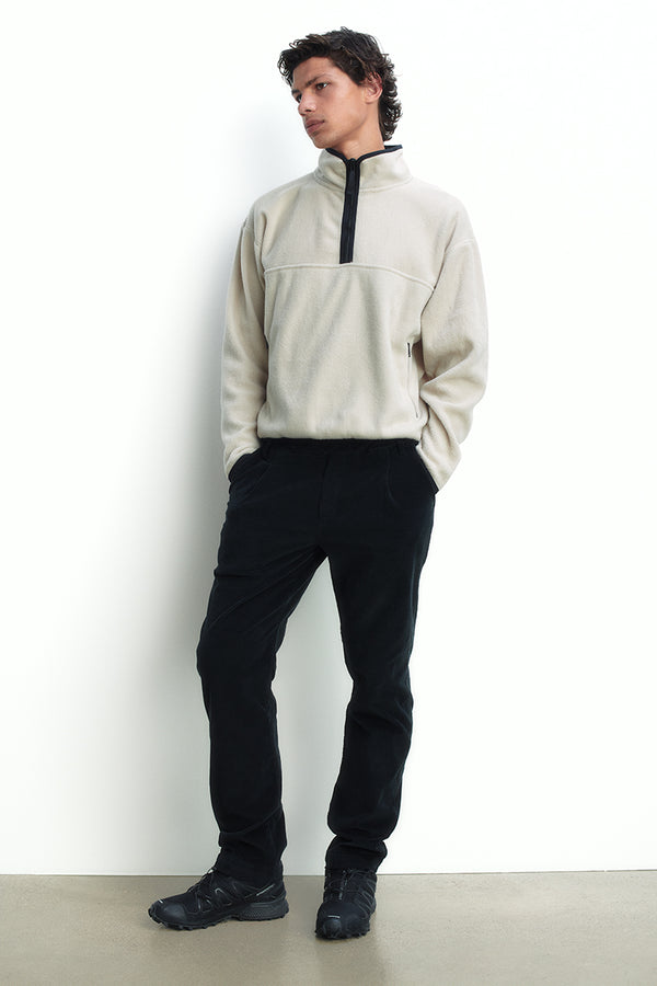 Pleated corduroy trousers