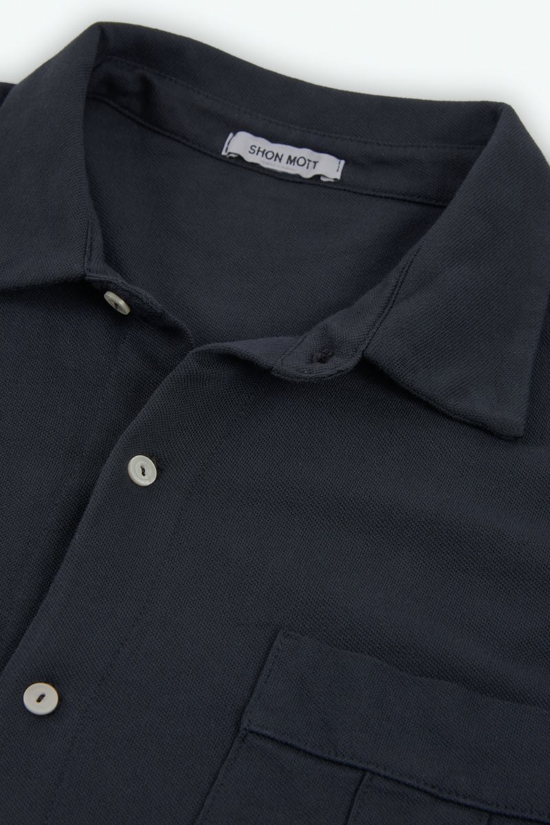 Camisa de pique con manga corta