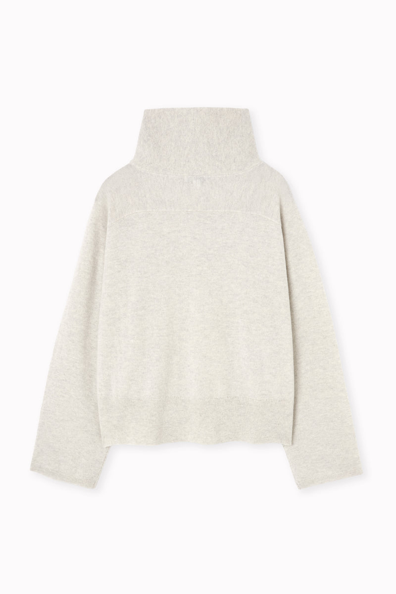 Jersey de cashmere con cuello cruzado