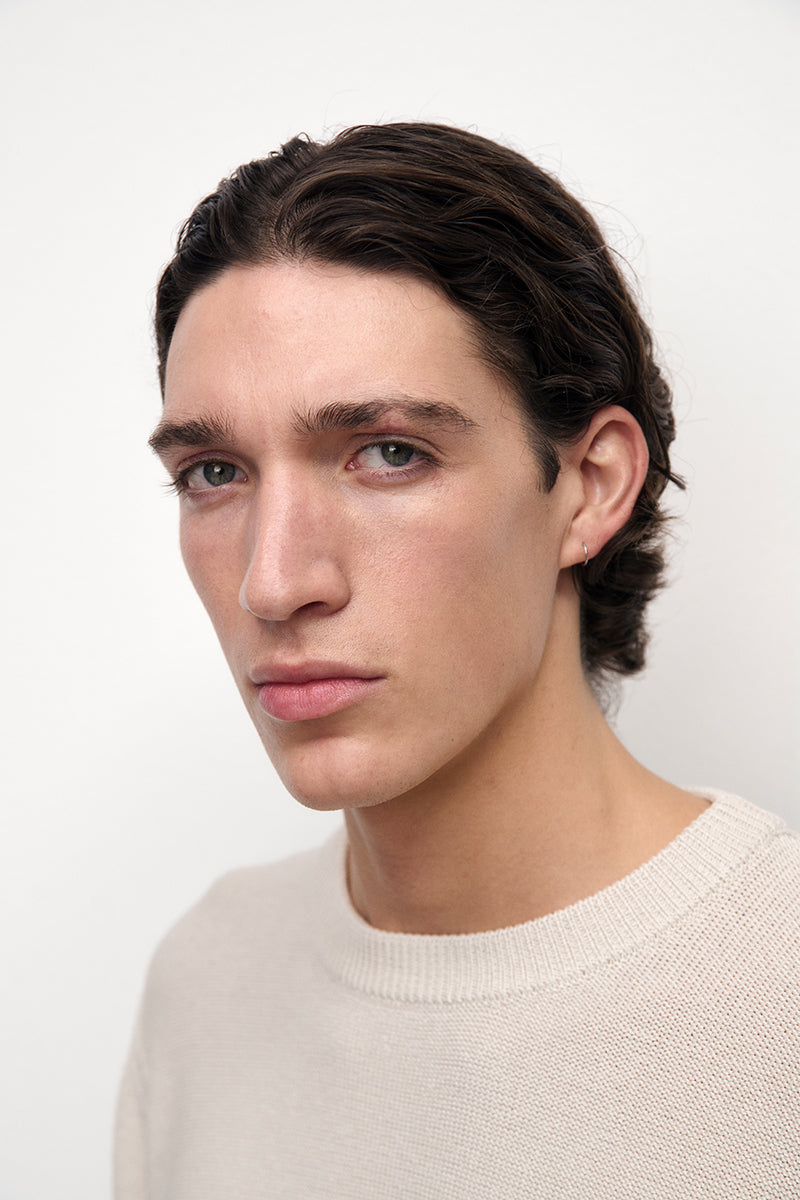 Reverse knitted sweater