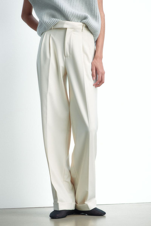 High-waisted pleated trousers