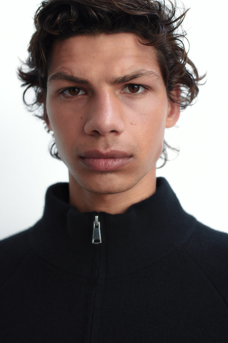 Jersey de cashmere con cuello alto y cremallera